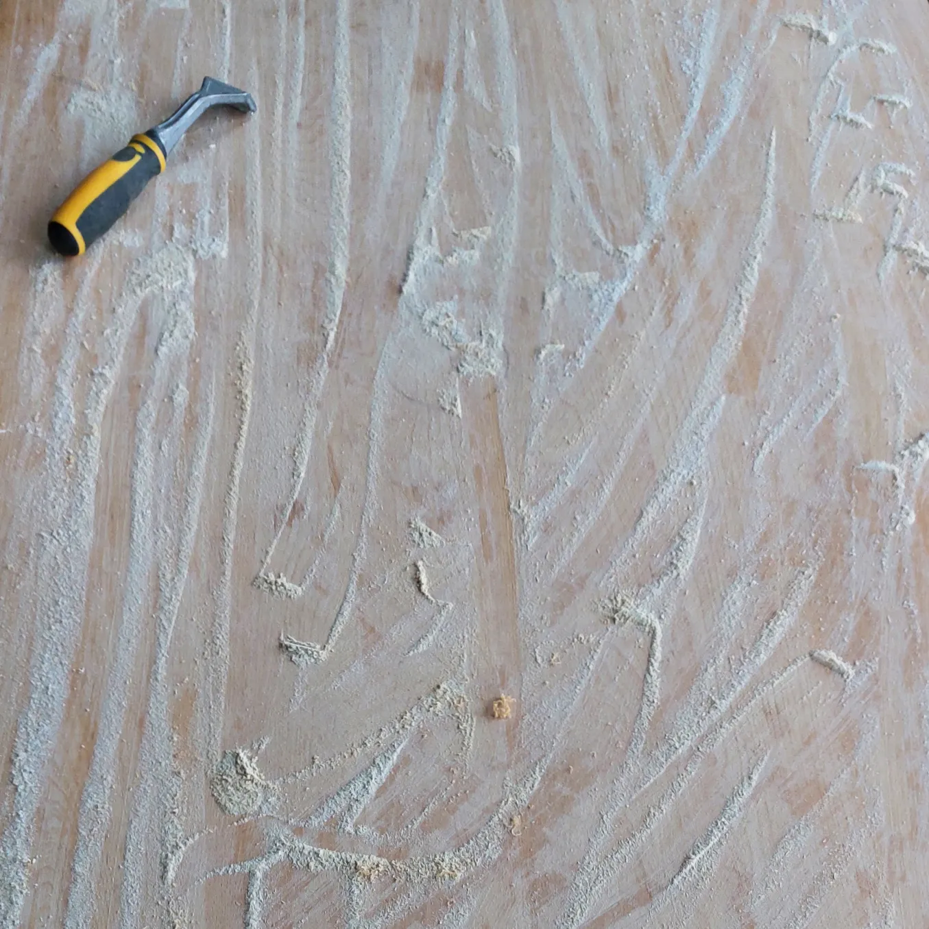 Dining table being prepared during restoration