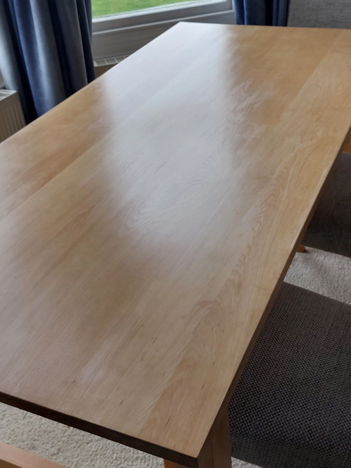 Close-up of the finished restored dining table