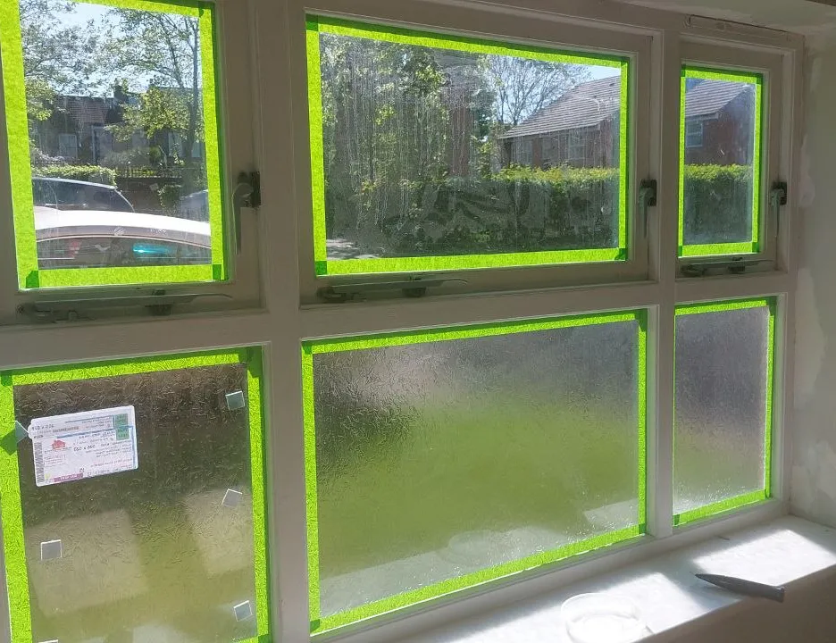 New double-glazed units fitted before final internal decoration