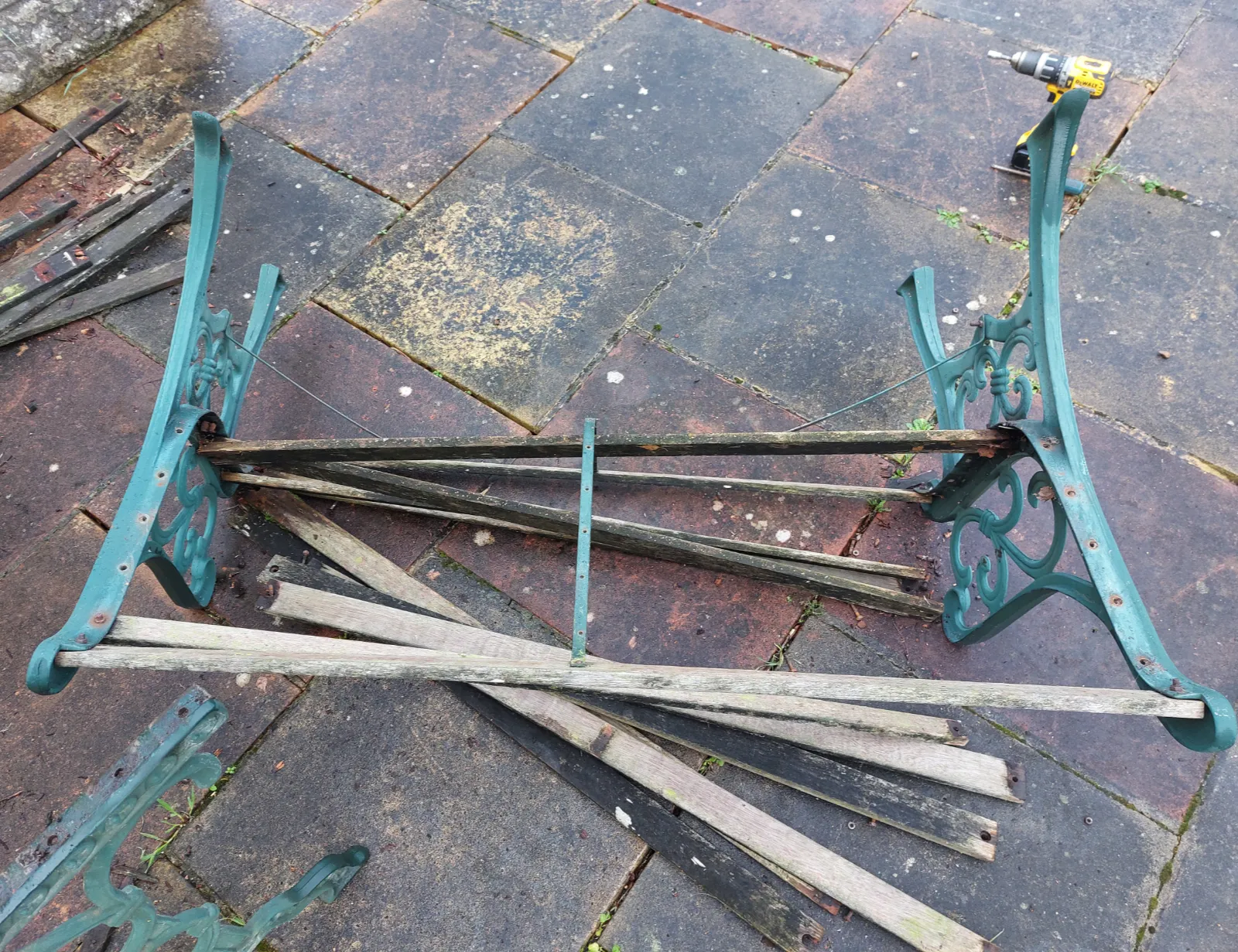 Garden bench dismantled ready for restoration