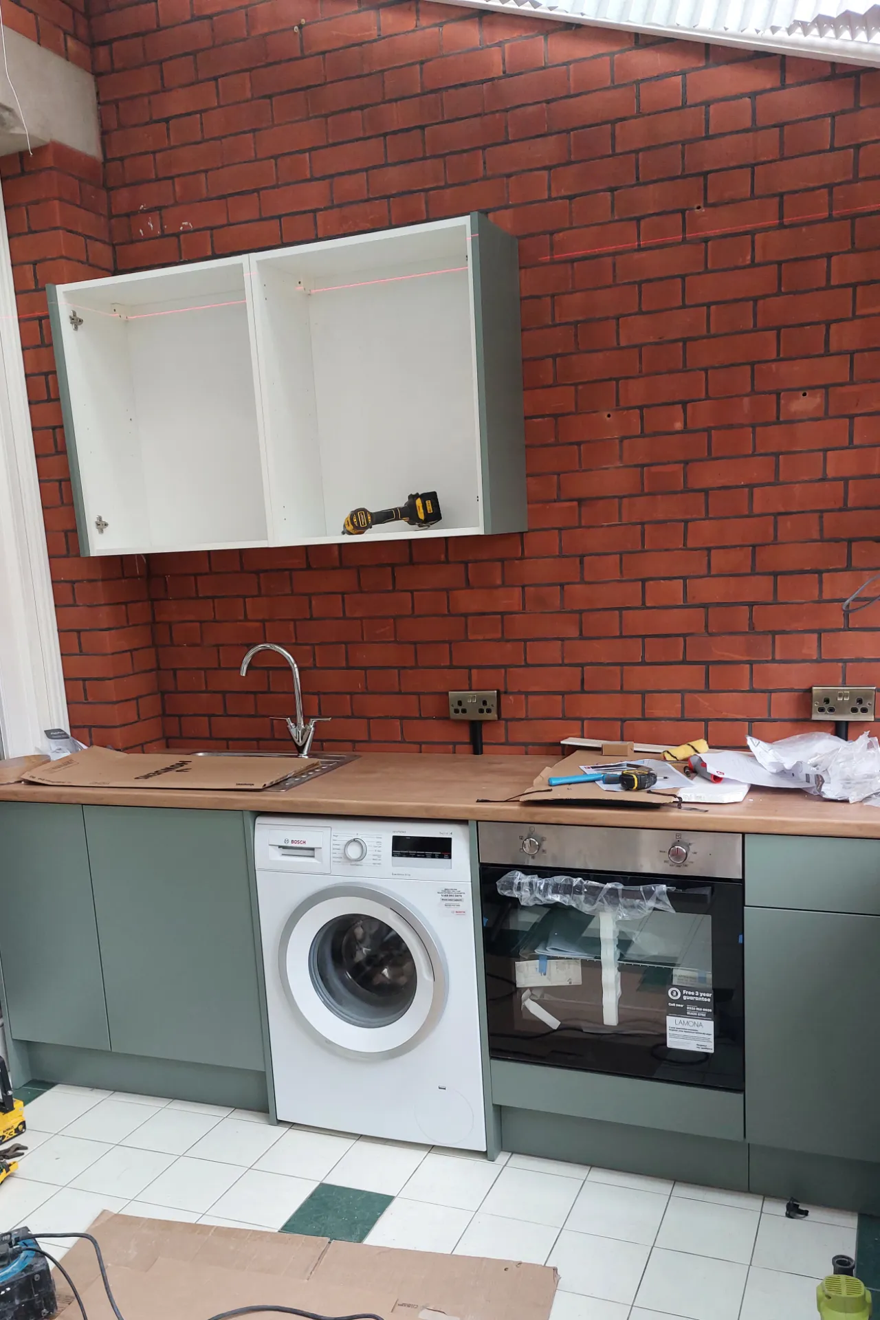 Later stage of the new kitchen installation