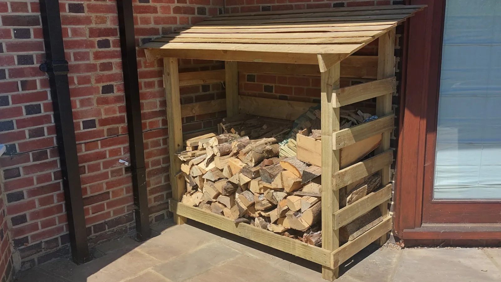 Completed timber log store filled with logs