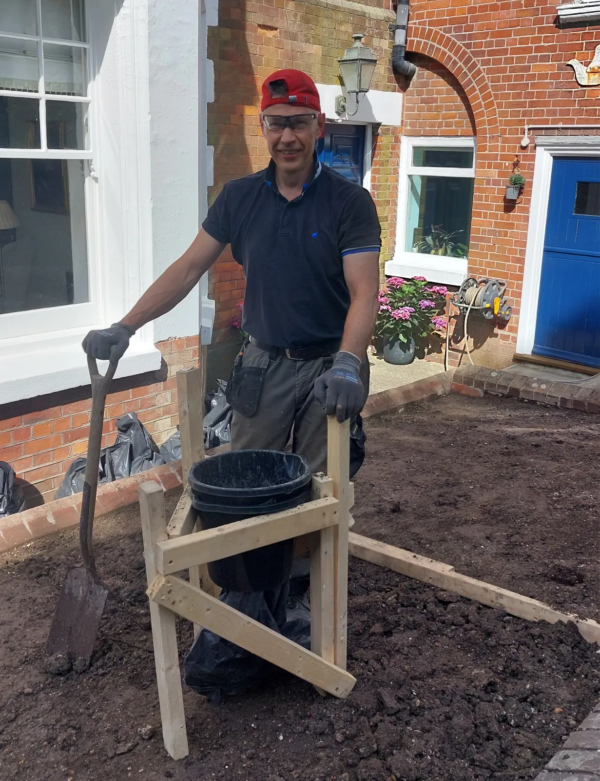 Garden area being prepared for a new shingle bed