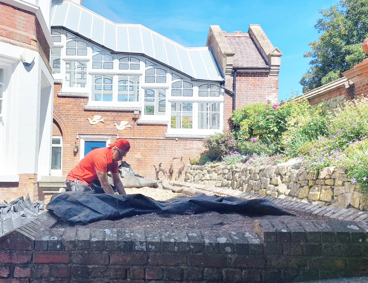 Barrier layer and beach stones being laid