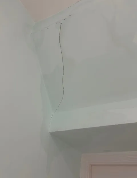 Damaged wall before plaster repair
