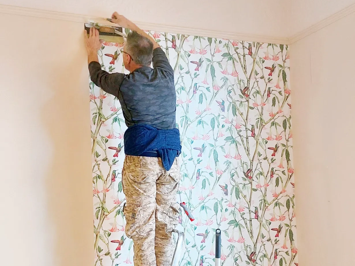Wallpapering bedroom