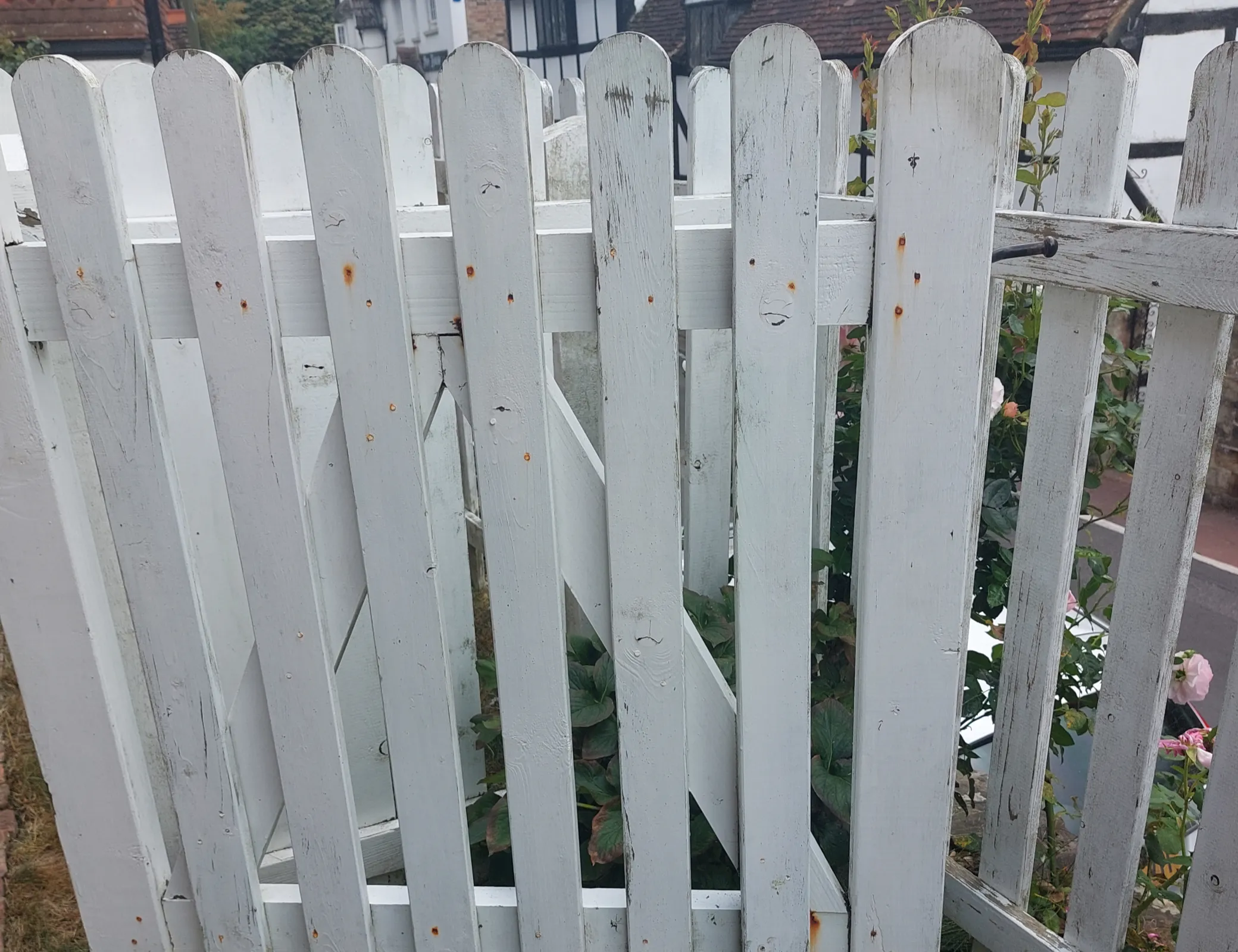 Garden fence being repaired and maintained