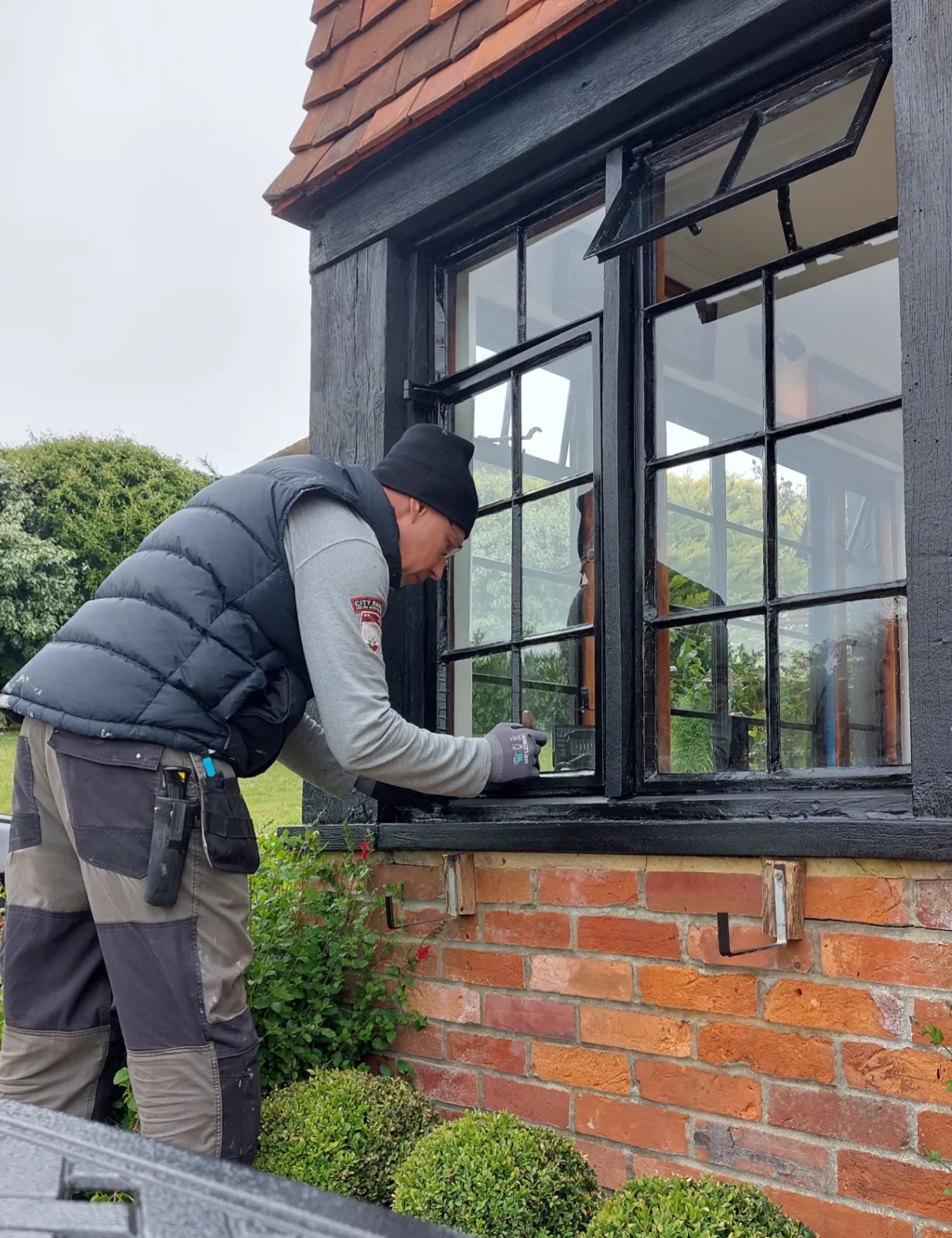 Exterior window being painted