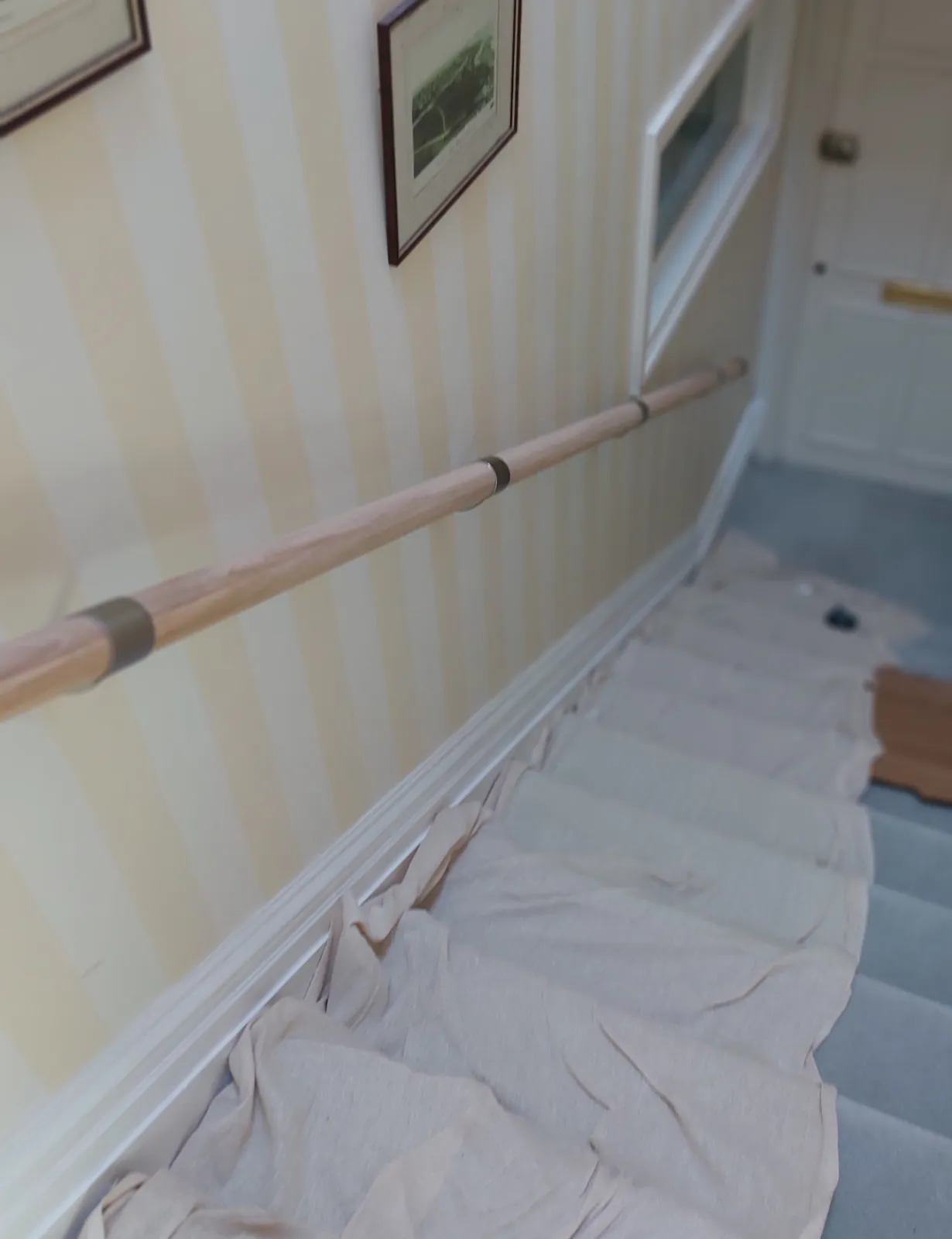 Newly fitted unpainted stair handrail