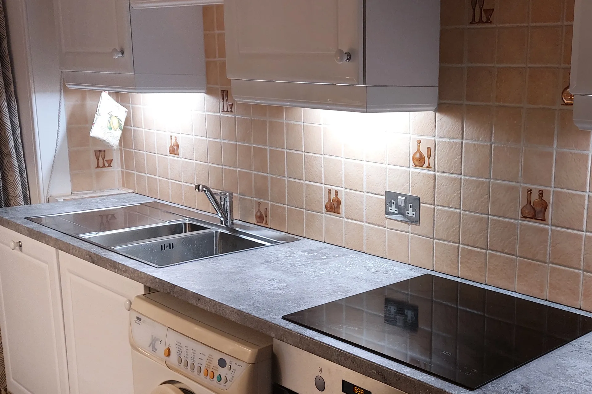 Kitchen after the replacement sink was fitted